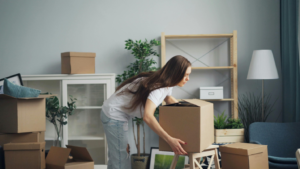 A person moving a box